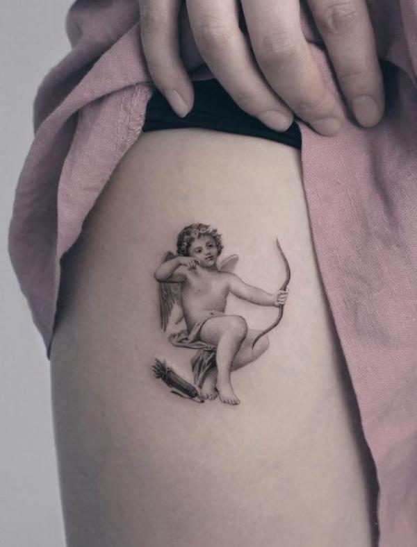 20 Cupid Tattoo Designs That Celebrate Love