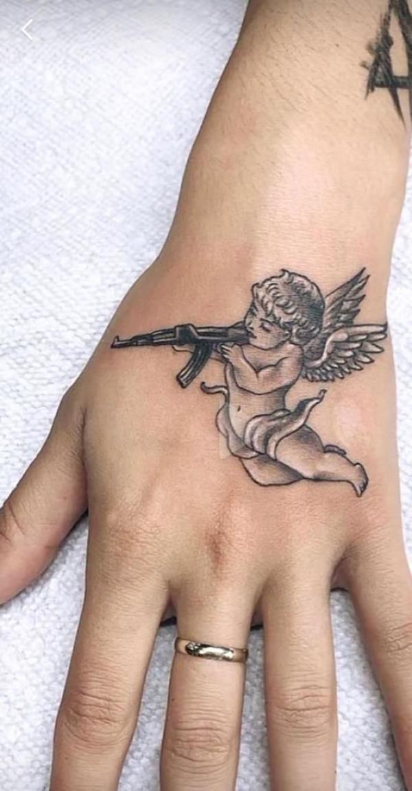 20 Cupid Tattoo Designs That Celebrate Love