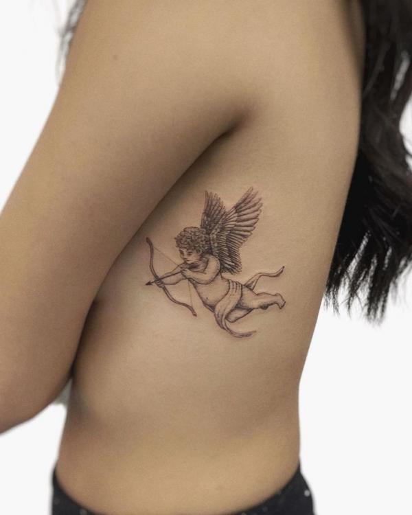 20 Cupid Tattoo Designs That Celebrate Love