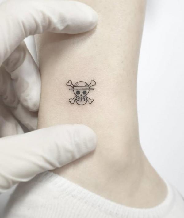 75 Striking One Piece Tattoos for Your Next Adventure