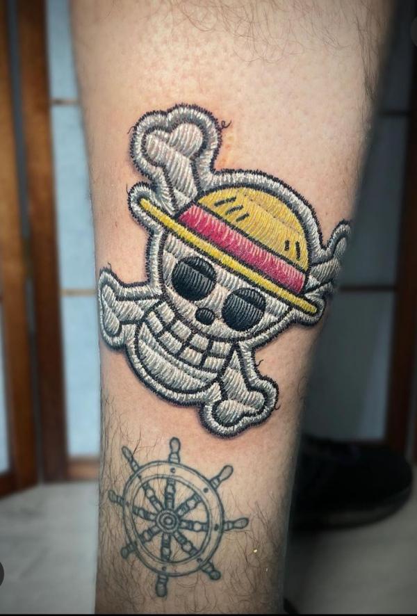 75 Striking One Piece Tattoos for Your Next Adventure