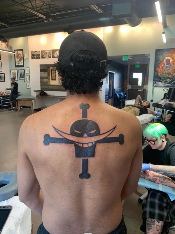 75 Striking One Piece Tattoos for Your Next Adventure