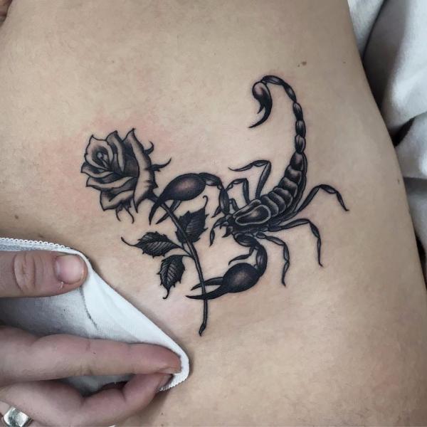 30 Captivating Black and White Rose Tattoo Designs