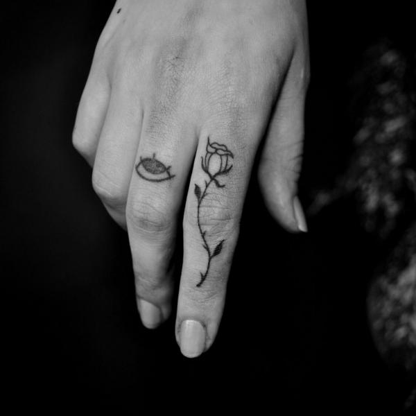 30 Captivating Black and White Rose Tattoo Designs